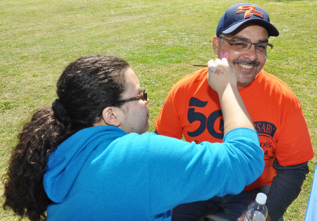 Eddie Cuencas, SFSC’s Panther Youth Partners coordinator, celebrated Valentine’s Day at the Kick-Off Celebration by getting a heart painted on his face from an SFSC art student. 