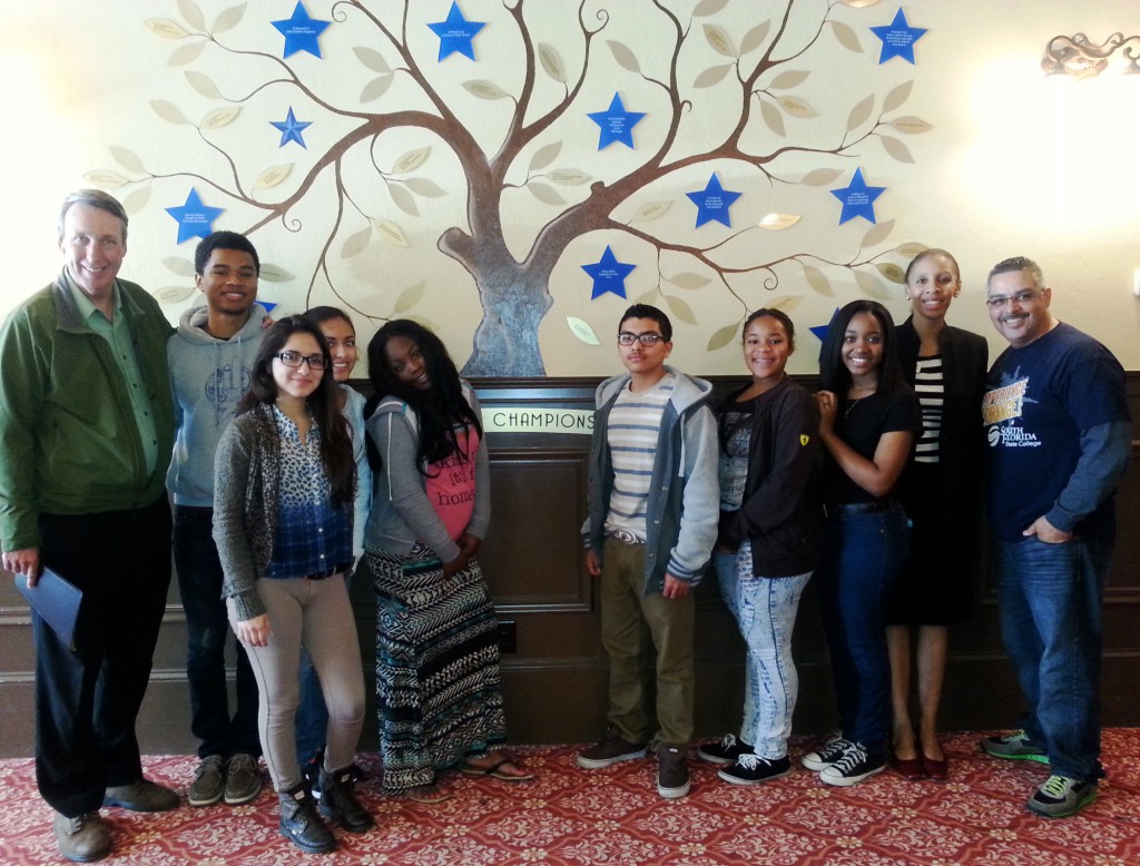 Pictured (left to right): Kevin J. Roberts, chief executive officer for Champion for Children; Daniel Contreras; Marcela Badillo; Selena Badillo;  Edeline Bebe; Honorio Marquez; Nyara Whitlock; Tikira Battle; Aisha Alayande, director for Drug Free Highlands; and Eddie Cuencas, coordinator for SFSC’s Panther Youth Partners program.  