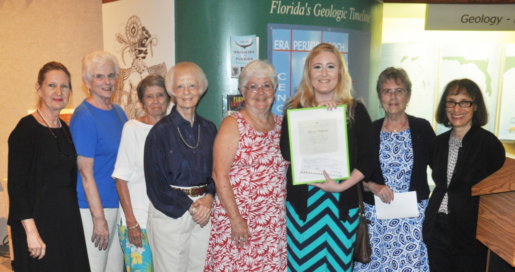 Missy Simpson, third from right, accepts a $300 check and plaque for winning the Tanglewood Art League Scholarship during the annual SFSC Student Art Show Awards ceremony April 16. Pictured with her are, from left: Cathy Futral, SFSC professor of art; Tanglewood Art League members Sandra Sephans, Judy Leblanc, Judith Eckstein, and Peggy Scefcyk; Missy Simpson; Norma Evans, president of the Tanglewood Art League; and Mollie Doctrow, SFSC MOFAC curator.