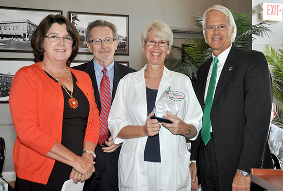 Nursing professor Joanne Foote (third from left) accepts her Endowed Teaching Chair in Nursing. Also pictured are Dr. Michele Heston, director of SFSC's nursing programs, Don Appelquist, executive director of the SFSC Foundation, and Dr. Tom Leitzel.