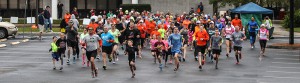 Runners take off at the starting line of the 2015 Panther 5K Run/Walk. 