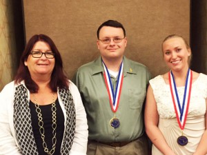 From left: Kimberly Hemler, Christian Reitnauer, and Eric Roberts after the All-Florida Academic Team awards ceremony.