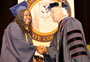 Sharmin Jones, student Commencement speaker, with Dr. Thomas C. Leitzel.