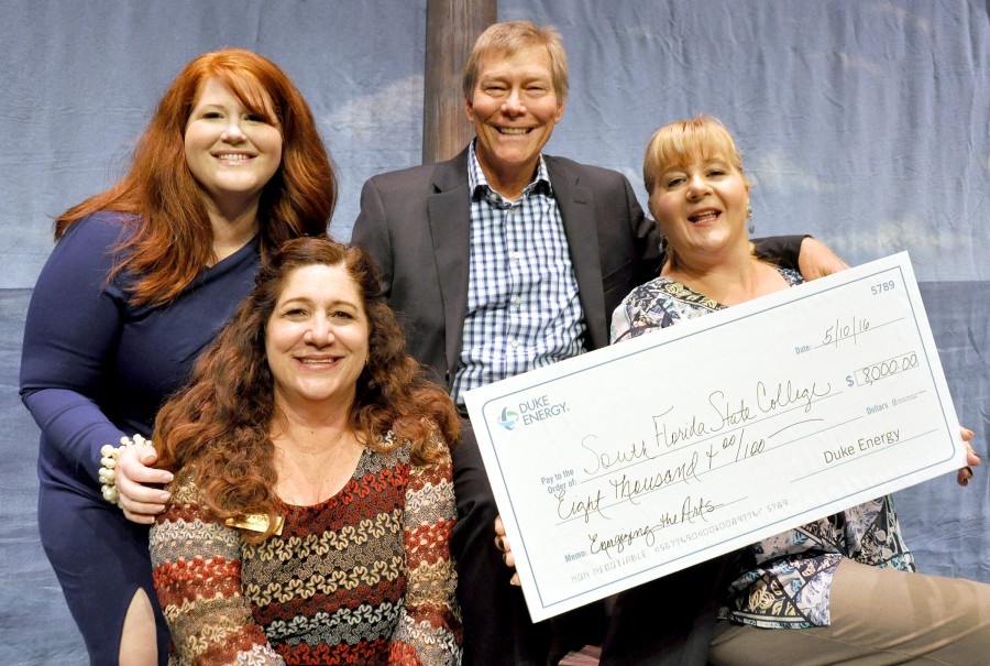 On behalf of the Duke Energy Foundation, Jerry Miller (center) presents an $8,000 check to the South Florida State College, which funds the 2015-16 season of Young People’s Theatre. Pictured with him are (left) Dr. Lindsay Lynch, SFSC’s director of grants development, Mitzi Farmer, SFSC cultural programs specialist, and Cindy Garren, director, SFSC Cultural Programs.