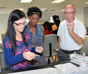 Dr. James Hawker with students during class.