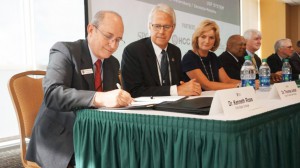 SFSC president Dr. Thomas C. Leitzel (second from left) at a ceremony at the University of South Florida launching FUSE.