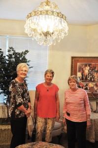 Under the chandelier or Room 208 of the Hotel Jacaranda. From left, Nancy Palmer, Barb Hall, and Joan Hartt.
