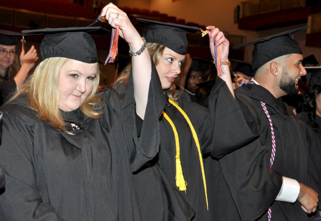 Associate degree students move their tassels from right to left, following a long tradition showing they've now earned their degrees.