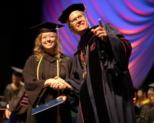 Graduate with President Leitzel