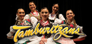 Five females smiling as the Tamburitzans, photo courtesy of The Tamburitzans