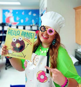 Spencer dressed as a donut baker