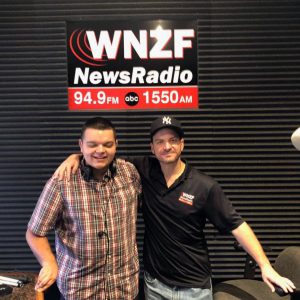 Trent Ferguson (left) with Rich Carroll, news and sports director, at WNZF