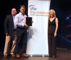Tres Stephenson, Foundation Board of Directors president; Hill Grififn; and Jamie Bateman, SFSC executive director of institutional advancement