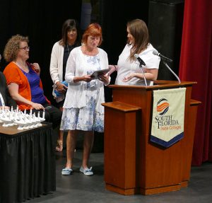 Mary Ellen Powrie receives the Golden D.U.C.K.