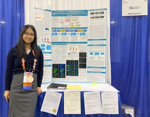 Angela Huang with her research poster at Regeneron ISEF