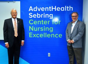 SFSC President Thomas Leitzel and AdventHealth CEO Randy Surber with the AdventHealth Sebring Center for Nursing Excellence sign