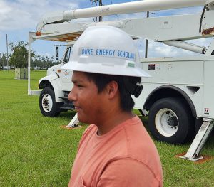 Hernandez in Duke scholar hard hat