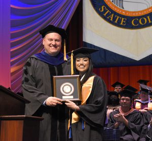 Student Commencement speaker, Jenale Alfonso Cruz (right)