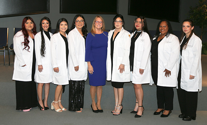 Surgical Services graduates and Kathy Sandmoen (center)