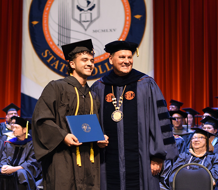 Graduate with SFSC President Fred Hawkins