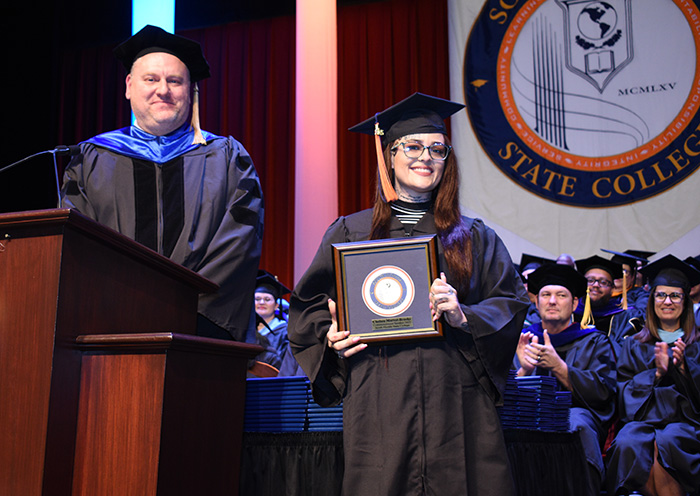 Dr. Mark Bukoski with Chelsea Marvel-Brooks, Commencement speaker