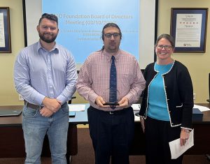 Dr. Joseph Velenovsky (center)