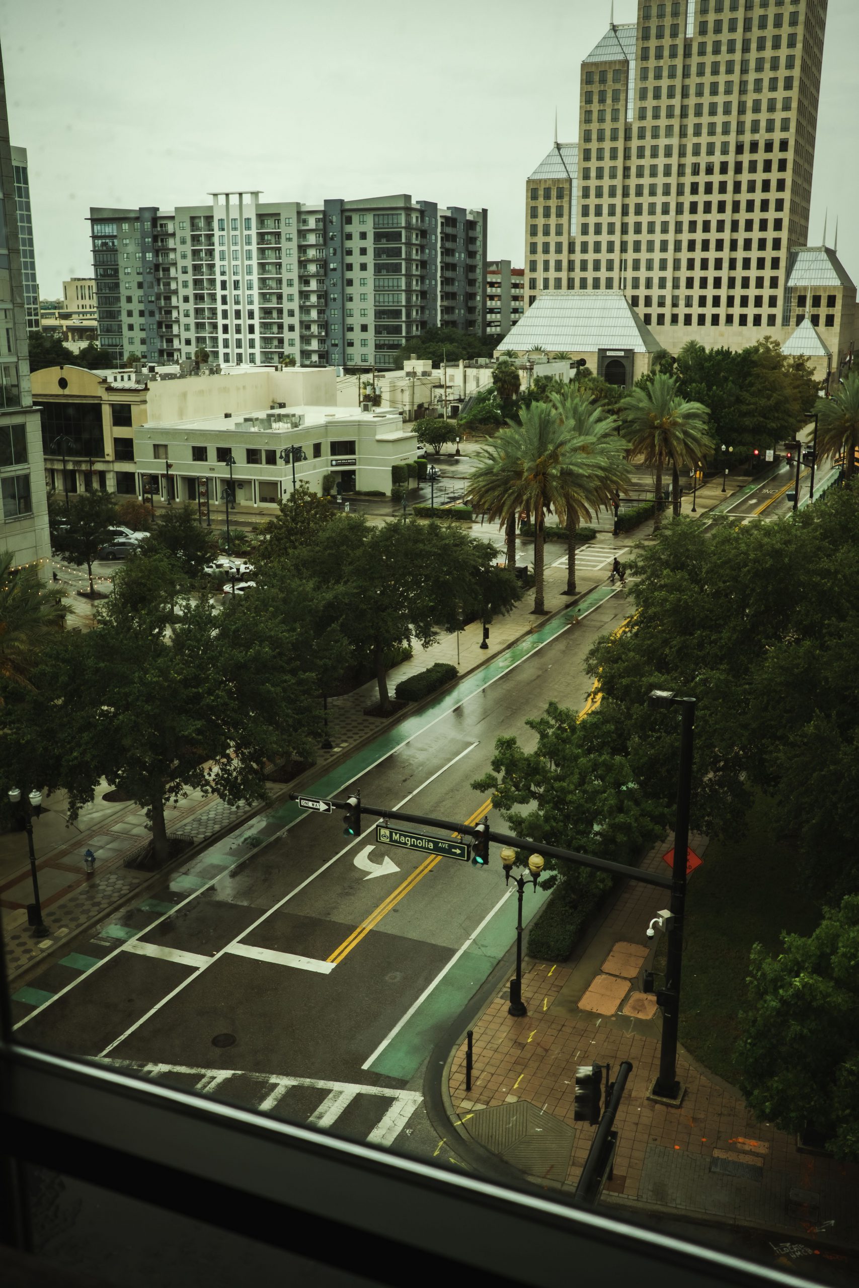 A city street from a tall building.