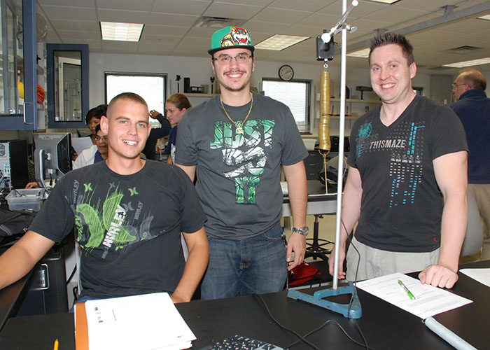 Evans (right) in SFSC Physics lab, 2013